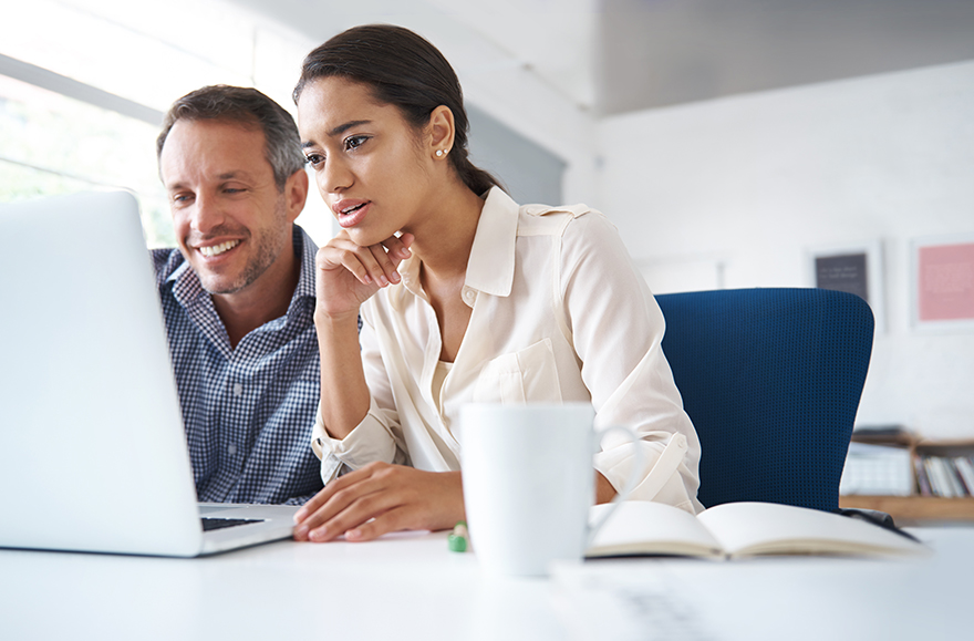 couple using a laptop